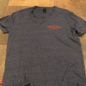 Blue Obey shirt with design and logo V-neck